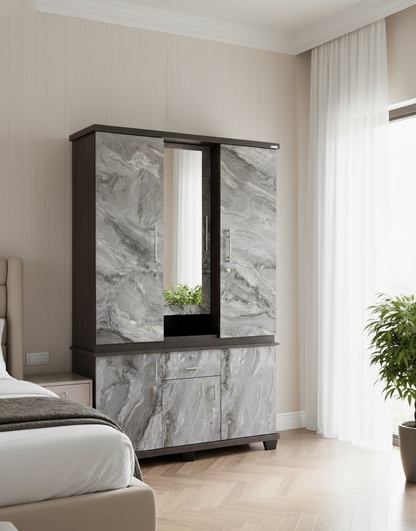 Marble-patterned cabinet in a bedroom setting with a bed and plant visible.